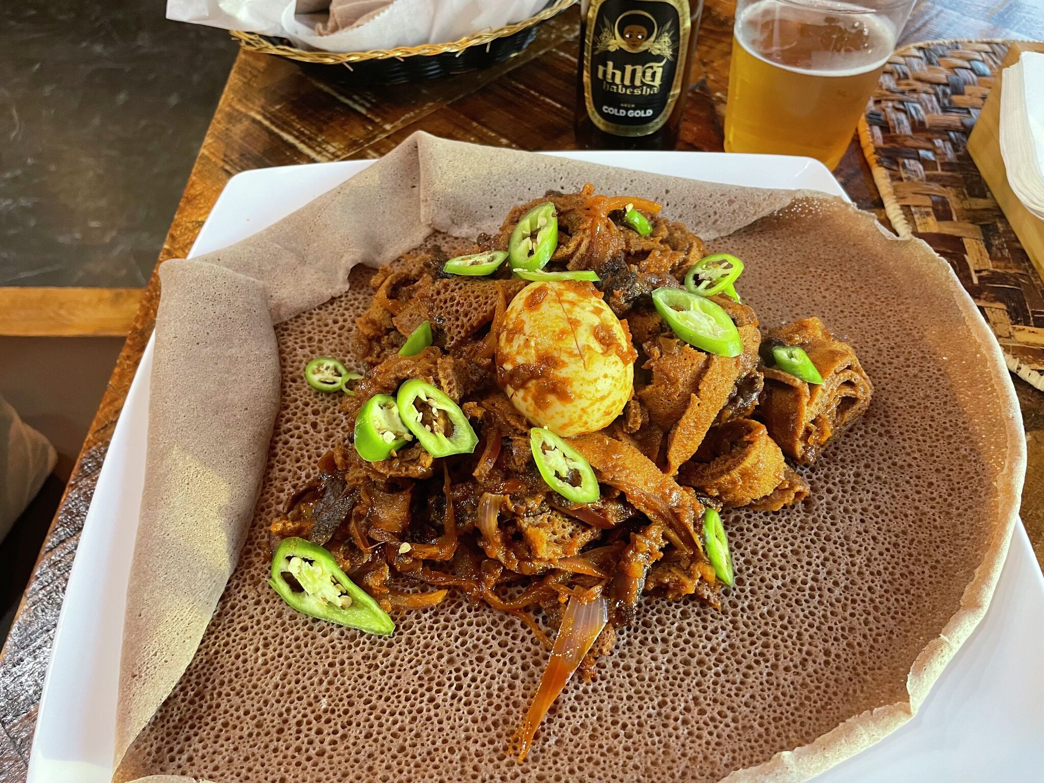 Eat of the Week: Spicy beef stew piled onto a savory pancake